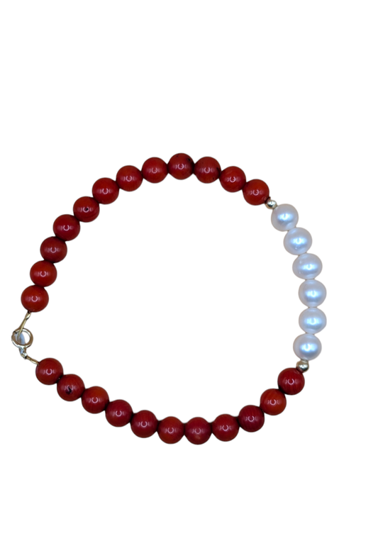 Bracelet with red stones and pearls